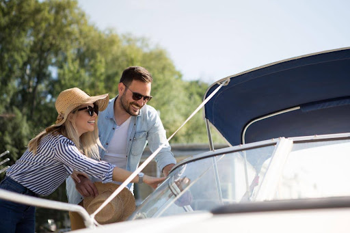 people checking out a boat